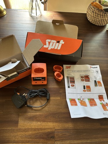 Paslode spit charger and - spit,