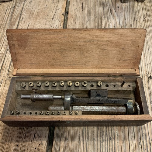 Watchmaker screw head - watchmaker's,