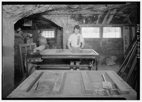 Loading clay into - 39., a
