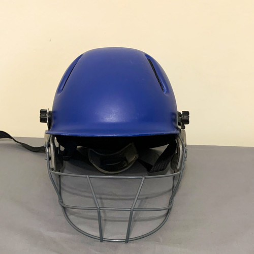 Blue cricket helmet with - cricket,