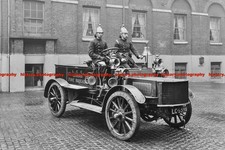 F001879 Firemen in brass