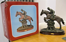 Horse & Jockey Jumping A Fence