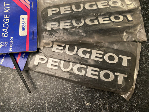 Genuine peugeot badge - oe,