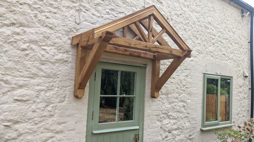 Wooden front door - canopy, porch
