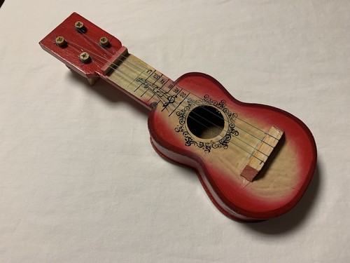 New wooden guitar - new,