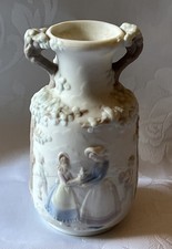 Scarce Lladro Bisque retired urn/vase in pastel colours.