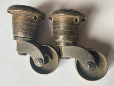 Pair Of Antique Brass Castors