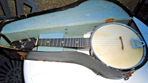 Vintage four stringed - four, banjo