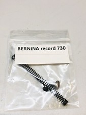 Presser foot bar spring and