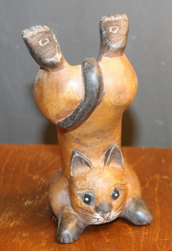 Carved wooden cat handstanding - carved,