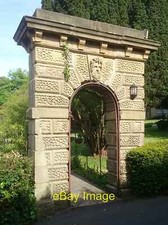 Stone arch in garden of