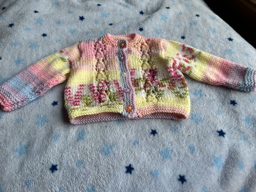 Hand knitted new born baby - hand,