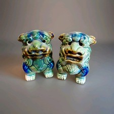 A Pair of Vintage Foo Dogs