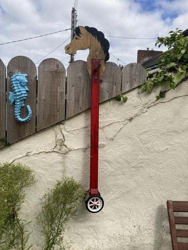 Vintage wooden stick wheeled