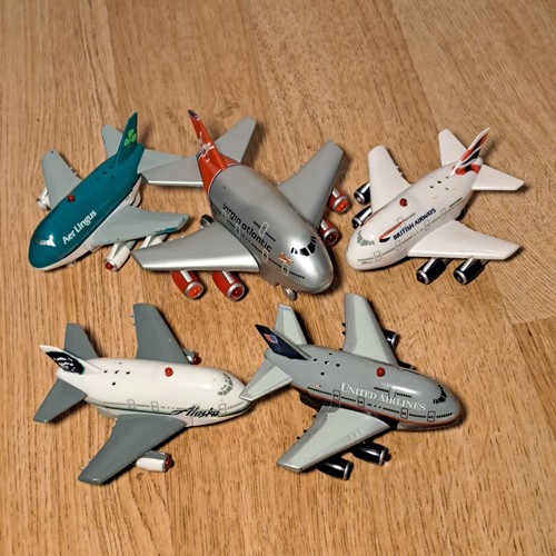 Five toy airplanes - five,