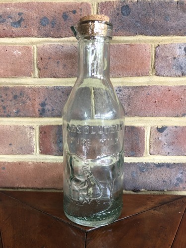 Vintage embossed glass bottle - embossed,