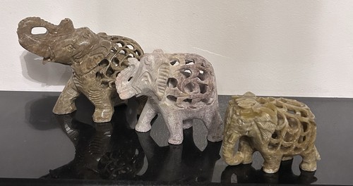 Three vintage hand carved - three,