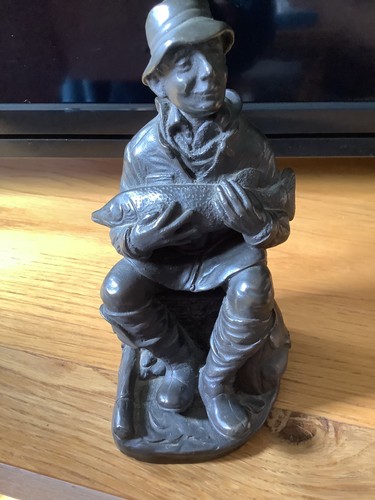 Heredities bronze fisherman - heredities,