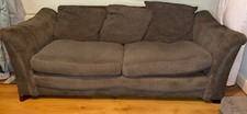 Two Brown colored three seater couches in used condition for free