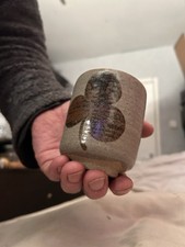 Pottery Cup With Clover Leaf