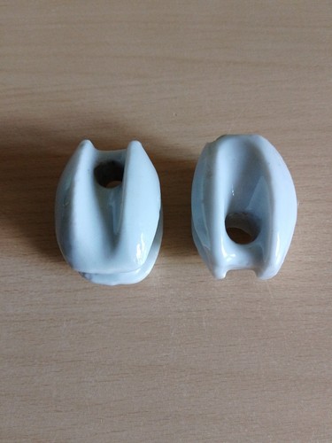 Pair ceramic egg insulators - of,