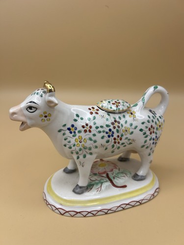 Staffordshire pottery cow