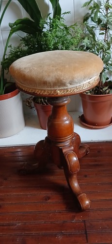 Antique mahogany swivel piano