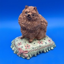 VINTAGE BRENDA (BASIL) MATTHEWS FIGURINE OF A FANCIFUL POMERANIAN DOG ON CUSHION