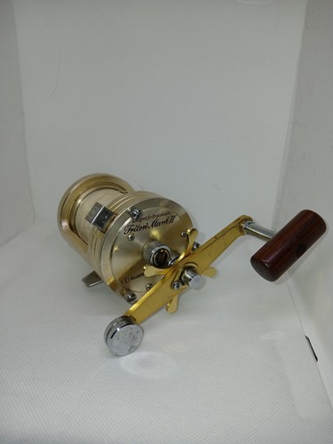 Shimano triton mark - mark, gold