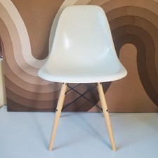 Vintage Herman Miller Eames White Side Shell Chair on an Ash Dowel Base