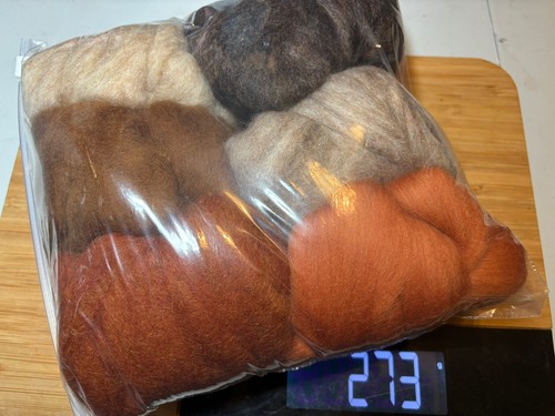 Just over 250 grams needle - just,