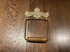 VINTAGE ANTIQUE STYLE  BRASS  TOILET ROLL HOLDER .