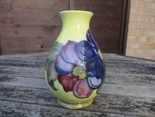 MOORCROFT  POTTERY. CLEMATIS ON YELLOW PATTERN VASE