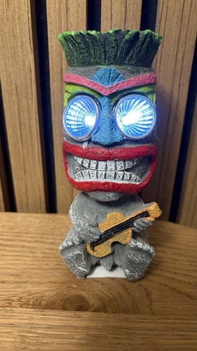 Tiki musical man big - big, eyes