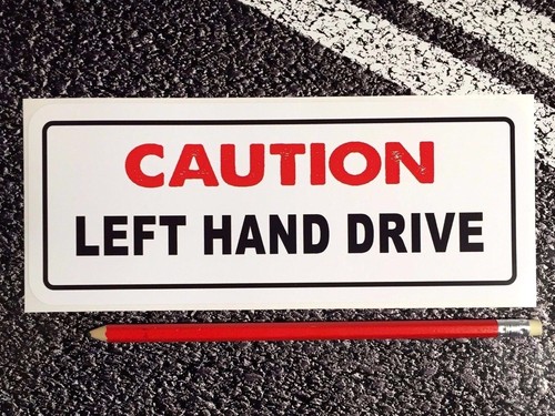 Left hand drive caution - hand,