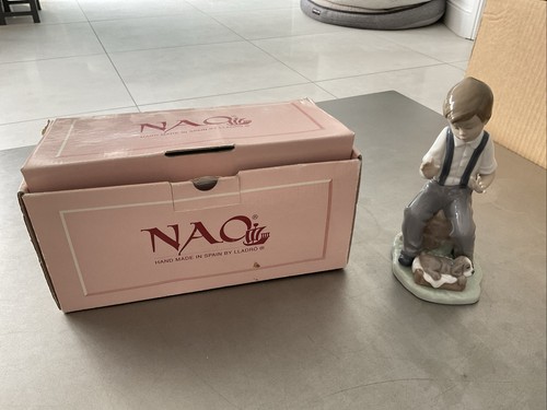 Nao lladro boy - boy, with
