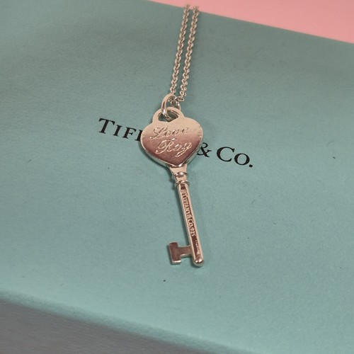 Tiffany return to key - &,