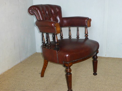 Antique captains upholstered