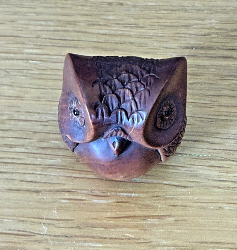 Hand carved wooden owl netsuke - hand,