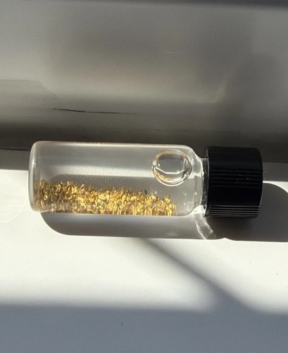 Small glass vial containing