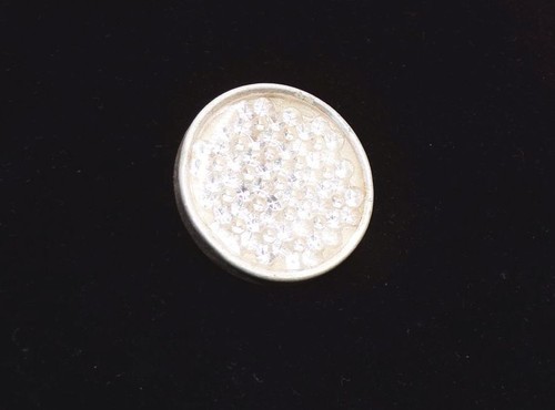 Old reflector cat - eye, white