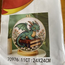 Dragon on books with hoop