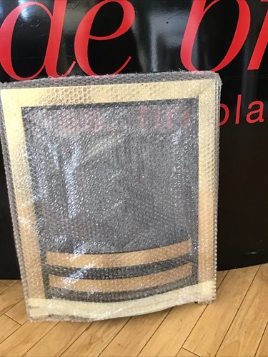 Brass and black signature - and,