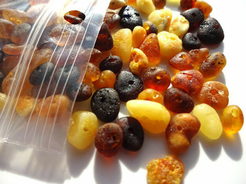 Real baltic holed amber - amber, loose