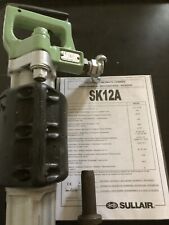 Sullair SK12 pile capping long stroke air breaker demolition basements 