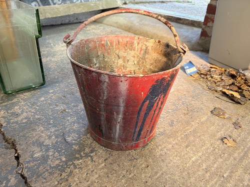 Red galvanised bucket - red,