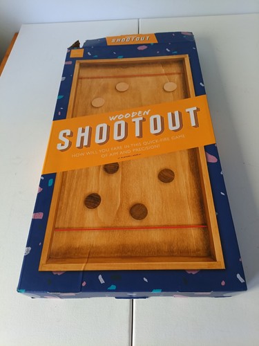 Wooden shootout slingshot puck - slingshot,