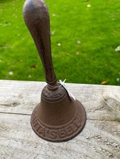 cast iron santa's bell. Beautiful cast iron bell with santas bell on it.
