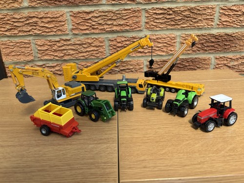 Siku crane and tractor - and,