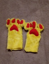 pair of yellow fursuit paws